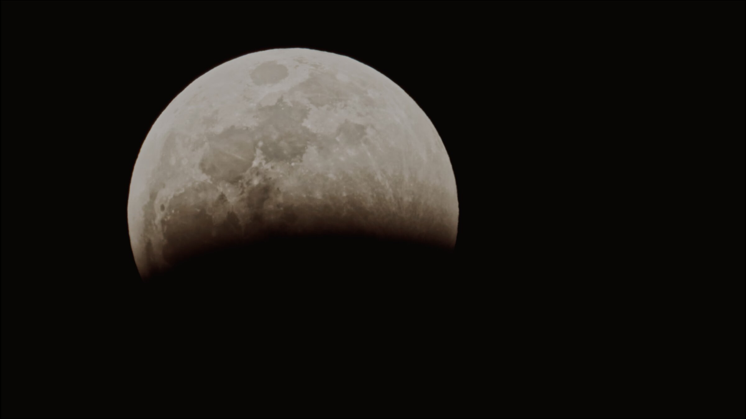 Detail of a crescent moon, telephoto